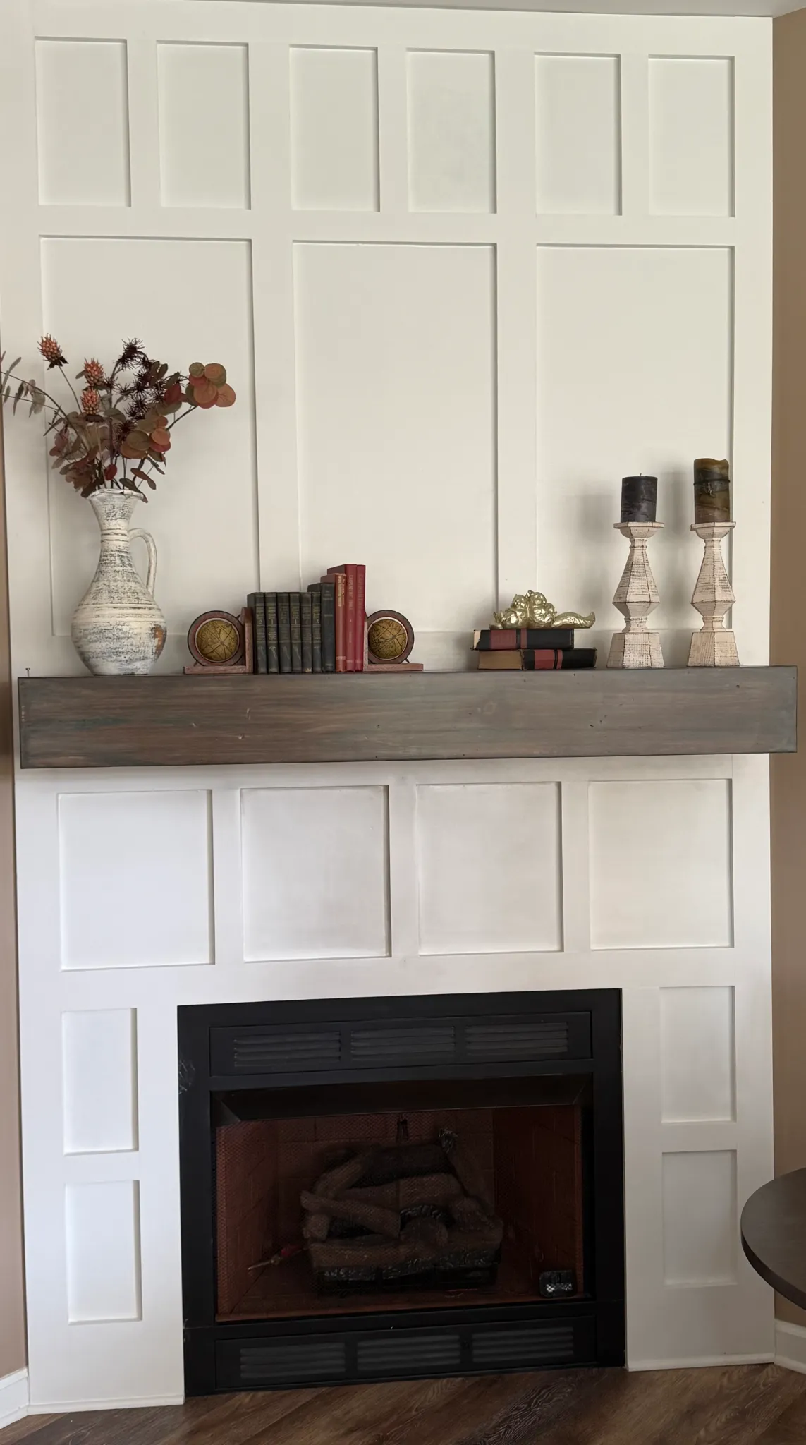 wainscot-and-custom-mantel-1788373991368.webp